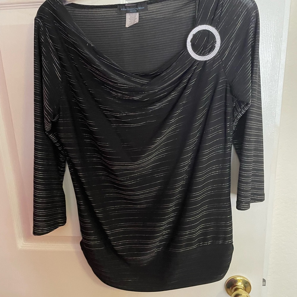 Beautiful dressy pullover top with buckle